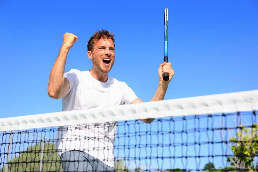 Tennis player celebrating victory - cheering man